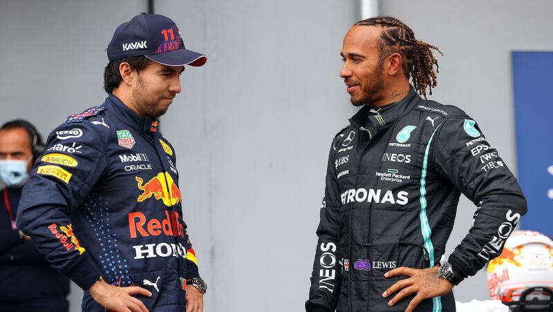 Lewis Hamilton y Checo Pérez | Getty Images