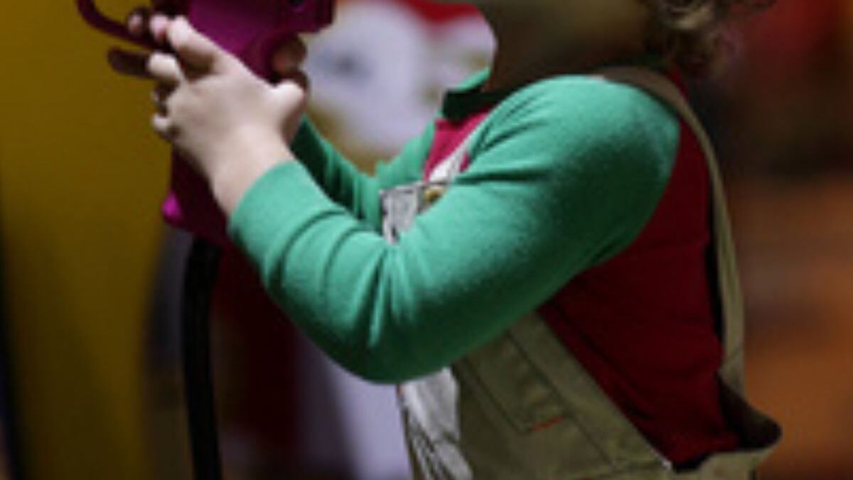 Menor con arma de fuego.