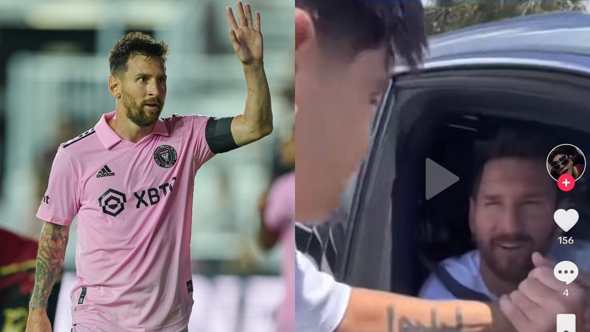 Lionel Messi saluda y le da un beso a un aficionado.