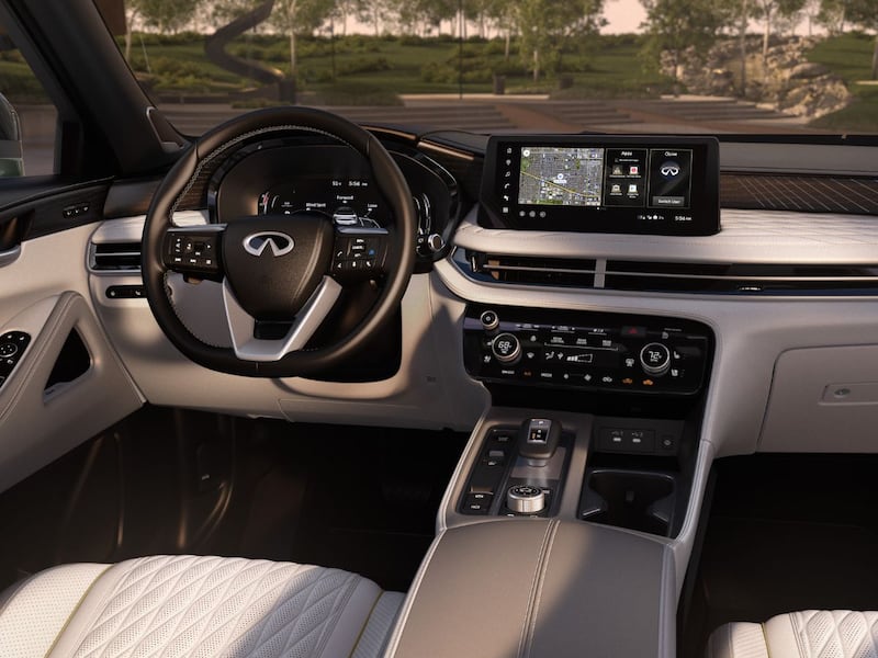 Cabina de INFINITI QX60 2026 con pantallas digitales y sistema Google Automotive Services