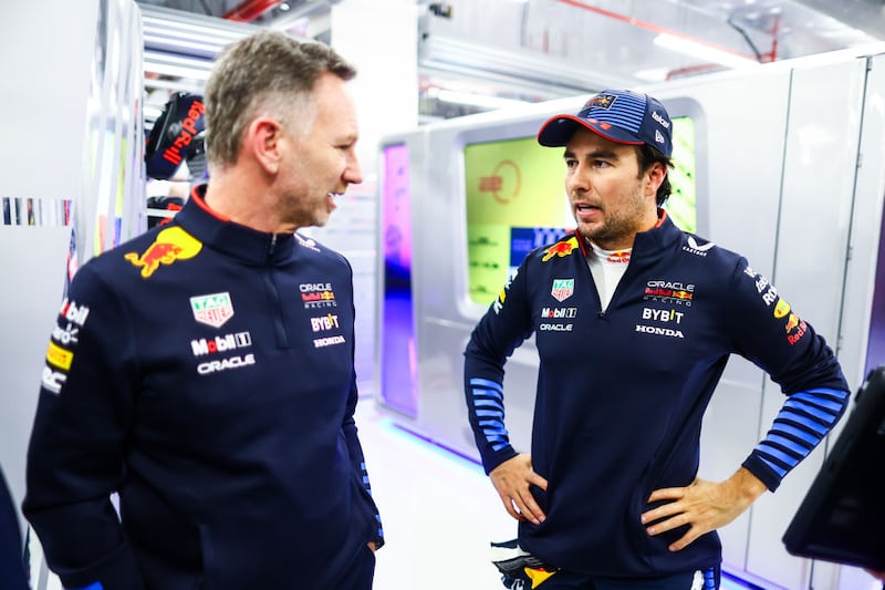 Christian Horner y Checo Pérez
