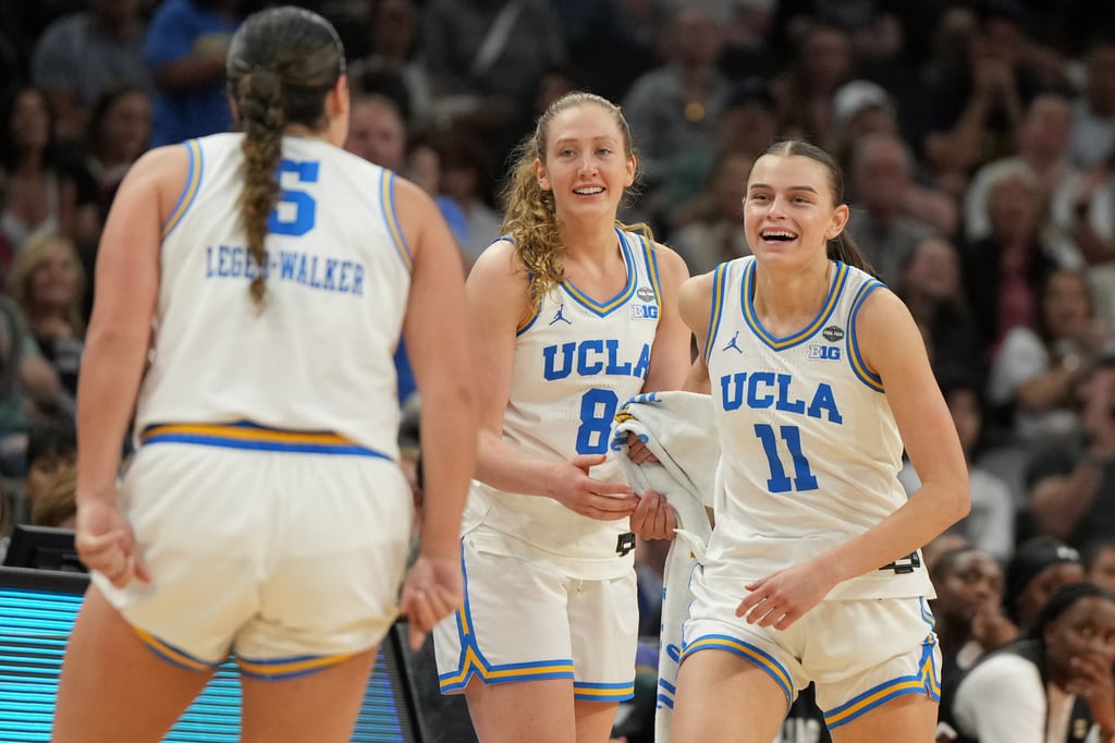 UCLA guard Gabriela Jaquez (11) celebrates after a play against South Carolina during the second half of the women's National Championship Final Four NCAA college basketball tournament game, Sunday, April 5, 2026, in Phoenix. (AP Photo/Rick Scuteri)