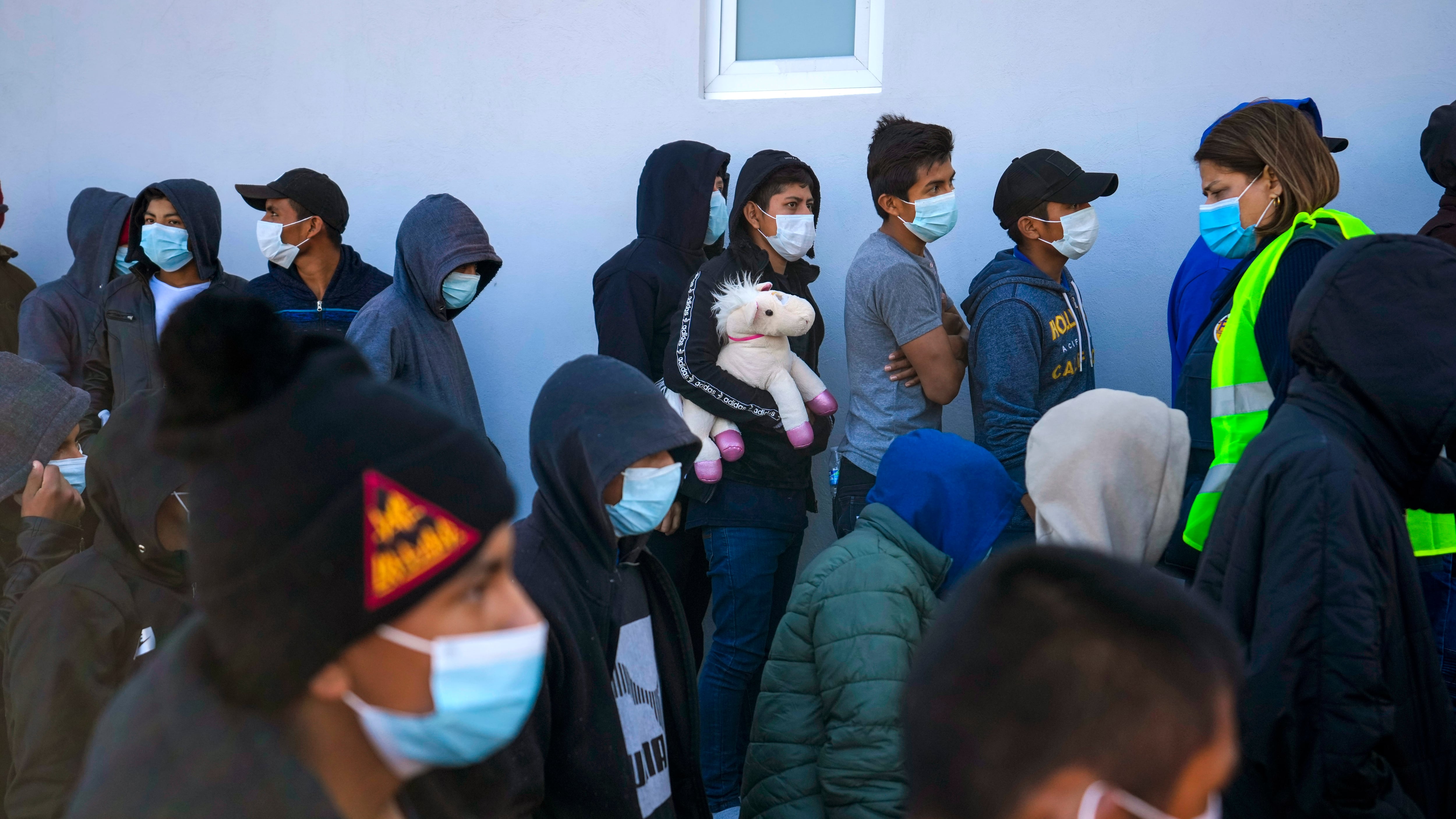 Unaccompanied Guatemalan children who were deported from Mexico deplane at La Aurora International Airport, in Guatemala City, Tuesday, Feb. 7, 2023. The children were stopped in the border between Mexico and United States. (AP Photo/Moises Castillo)