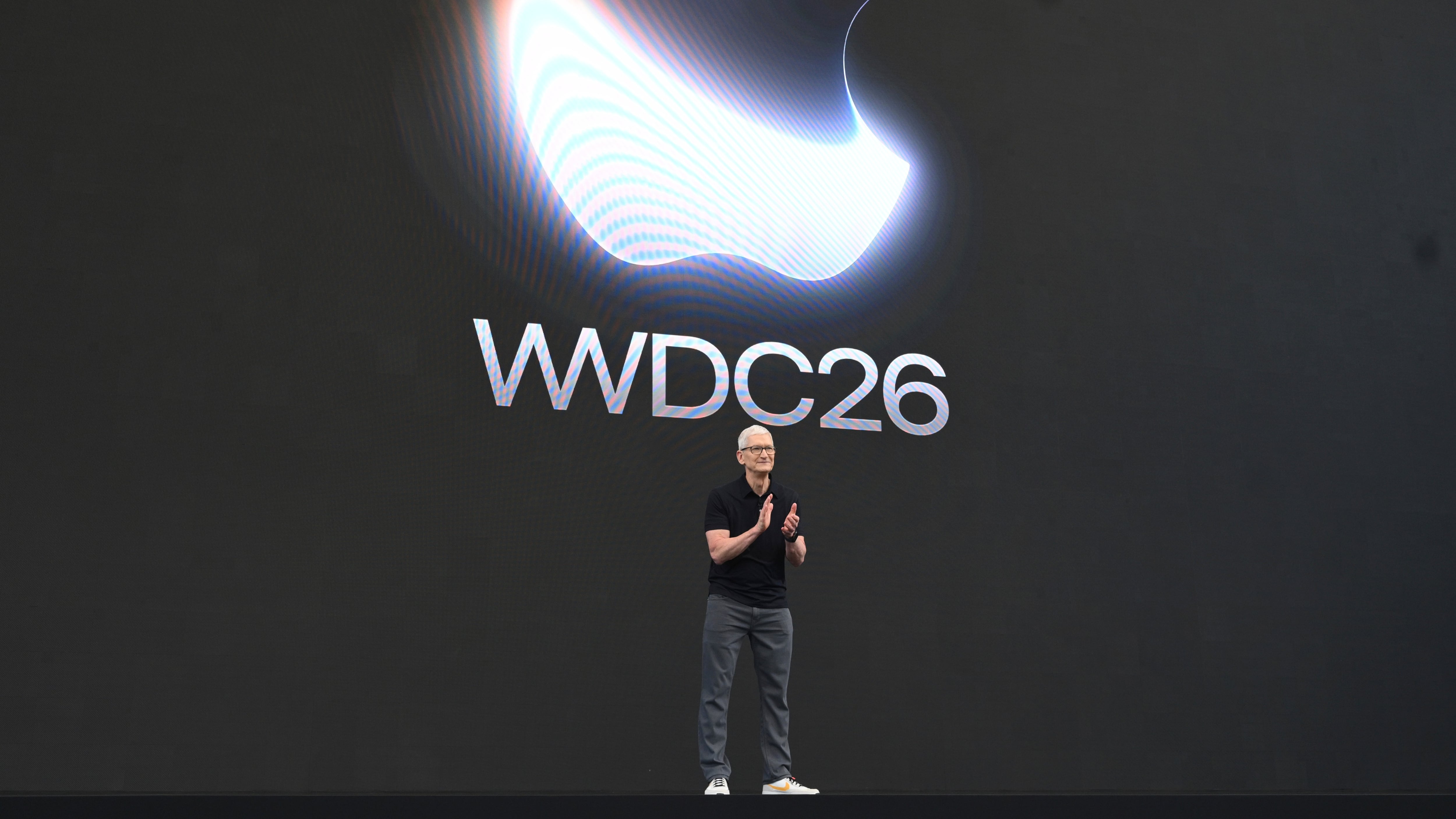 CEO Tim Cook stands on stage at the annual World Wide Developers Conference at Apple's headquarters in Cupertino, Calif