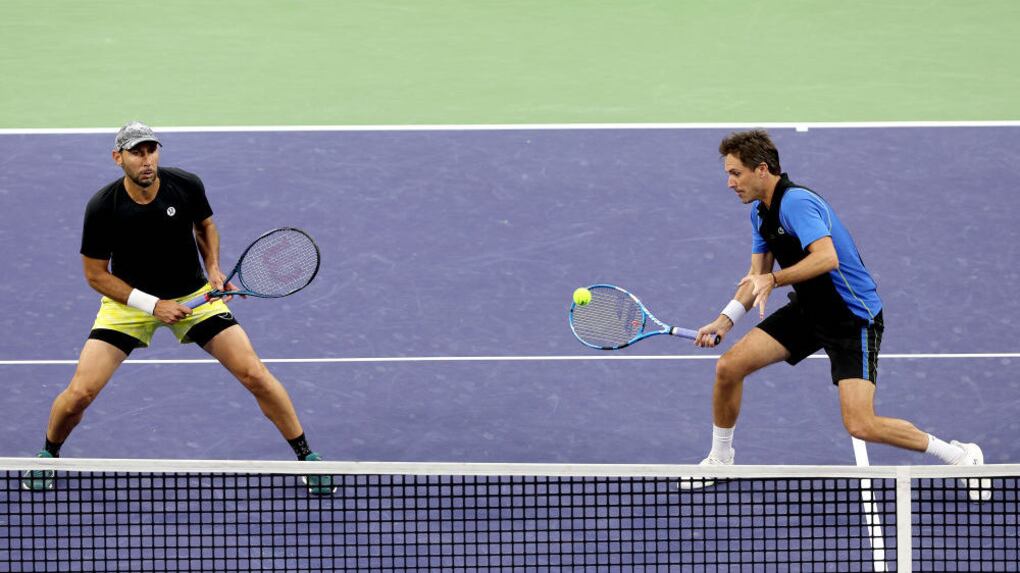 Santiago Giménez y Édouard Roger-Vasselin