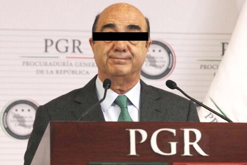 Murillo Karam es custodiado por la GN para cumplir con prisión domiciliaria