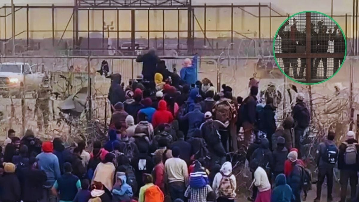 Migrantes enfrentan a GN en la frontera; intentan derrumbar valla para entrar a EE.UU.
