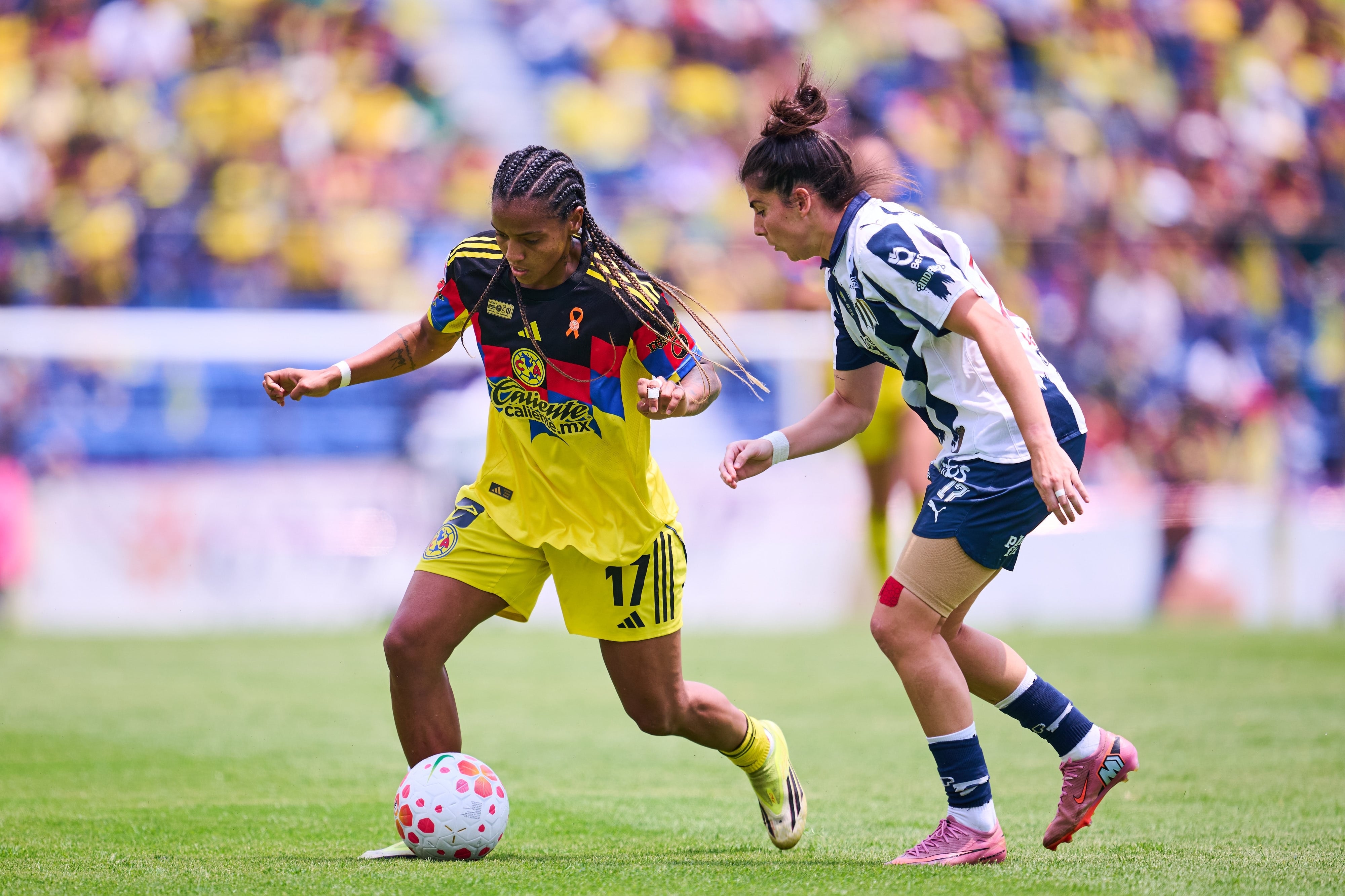 Geyse Da Silva (L) of America fights for the ball with Lucia Garcia (R) of Monterrey during the final first leg match between America vs (and) Monterrey as part of the Liga BBVA MX Femenil, Torneo Clausura 2026 at Ciudad de los Deportes Stadium, on May 17, 2026 in Mexico City, Mexico.