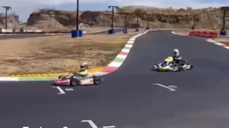 Checo Pérez y su hijo