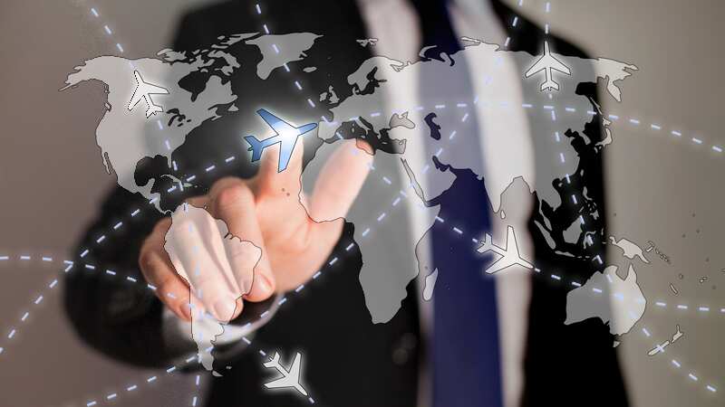business travel concept, paths of airplanes on the worldmap